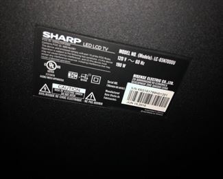 Specs and model serial information on Sharp TV