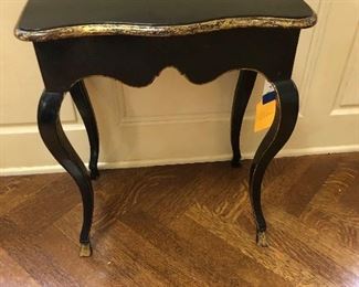 A Continental rococo parcel gilt and ebonized wood side table 18th century 22"h x 18"w x 10.5"d valued at $1500 - $2500  asking $680