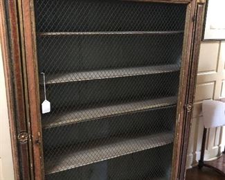 An Italian neoclassical style parcel gilt and painted wood wire door bibliotecque.  Approximately 69"h x 53"w x 16"d.  Valued at $2500 - $3500 asking $1200