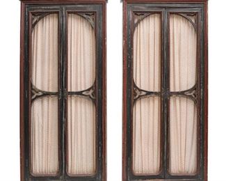 A pair of Gothic style painted wood and wire door bibliotheques, 19th century.   They measure 93"h x 40"w x 12.25" d valued at $3000 - $5000 asking $2400