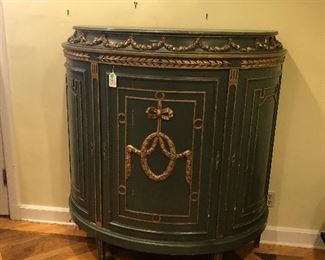 A continental neoclassical style parcel gilt and painted wood demilune cabinet, 20th century.  55"h x 51"w x 21.5"d.  Valued at $2000 - $3000 asking $1400