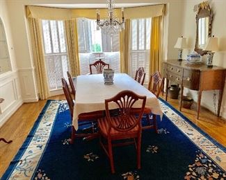 Baccarat chandelier, dining room table and chairs