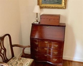 Slant front, serpentine desk, closed