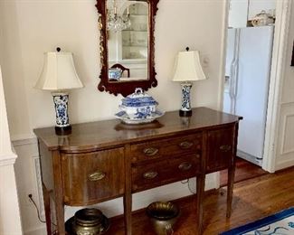 Antique sideboard with Chippendale mirror