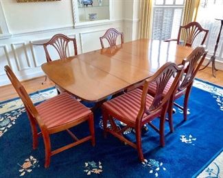 Large drop leaf dining room table with 6 shield back chairs