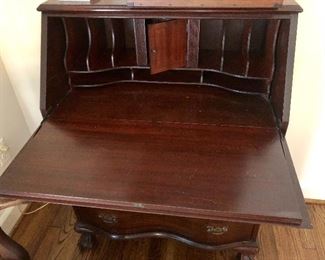 Slant front, serpentine desk, open
