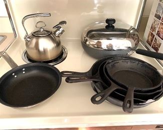Cast iron pots , pans