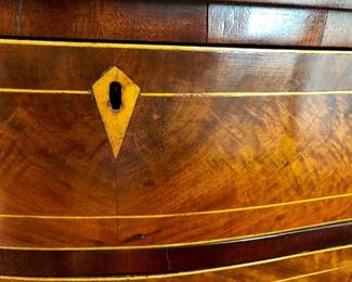 Inlay detail of serpentine dresser