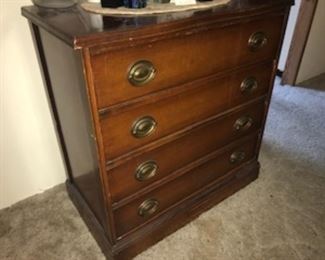 Four drawer wood dresser