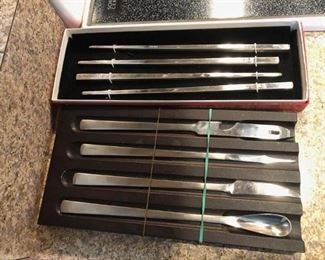 Set of chop -sticks and cheese tray tools