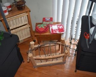 Table with Baskets, Newspaper Rack, Stool