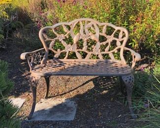 Metal garden bench--adorned with hummingbirds