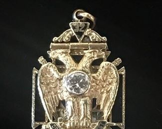 Masonic pendant with a diamond and set in solid gold