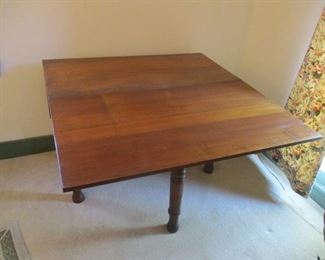 Antique Walnut Gate Leg Table. Shown with one leaf raised and on leg. 