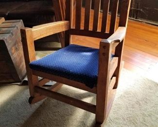 Oak Craftsman Style Rocker.  Many a child has been rocked to sleep in this.