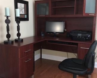 Desk with cabinets; office chair