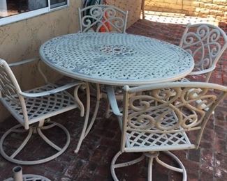 Metal patio set with swivel chairs
