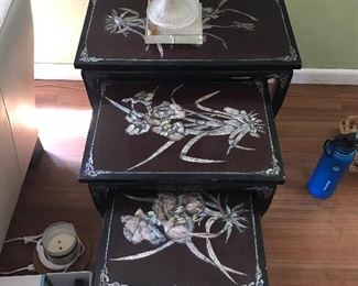Three piece Vietnamese black lacquer mother of pearl nesting tables