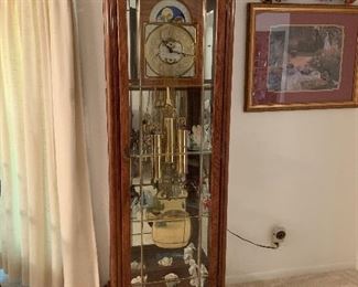 Unique grandfather clock with lighted curio shelves- very unique!