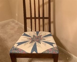 Wooden chair with quilted seat