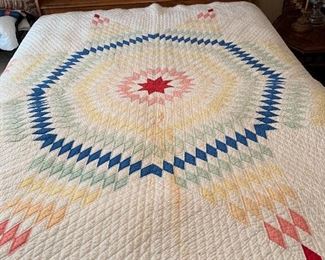 Very old, hand quilted, starburst pattern quilt. Lovely hand work. 