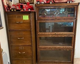 Antique wooden file cabinet and leaded glass lawyers bookcase