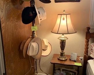 Brass coat rack, hats, matching pair brass lamps, vintage magazines
