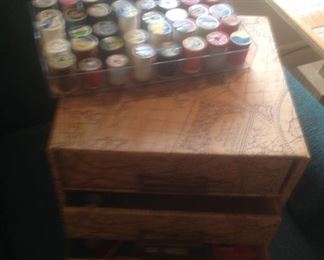 Sewing drawers filled with sewing items...also a tray of spools of thread 