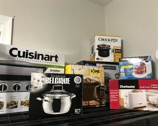 Many brand new appliances and pots and pans