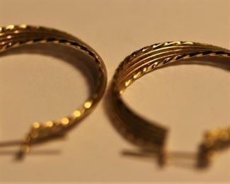 Pair of gold earrings.  