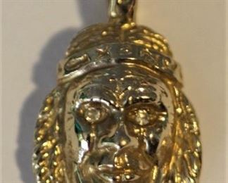 14 kt. pendant of Native American.  