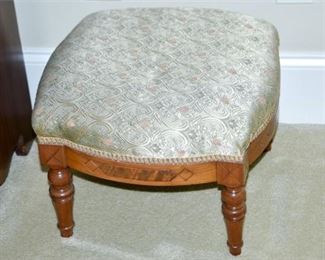 65. Upholstered Footstool