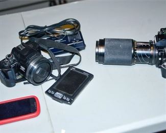 138. Two 2 Film Cameras and Samsung Phone