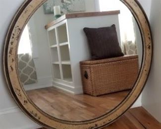 Large round mirror.