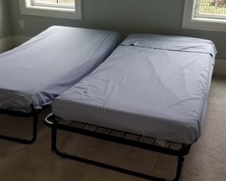 Fold away cots priced individually. 