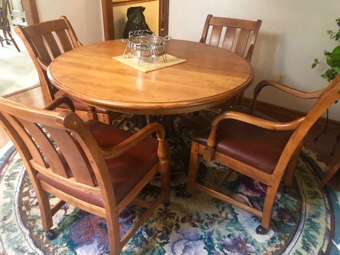 This is the Ethan Allen Table & Chairs Set - we have it displayed at the house with the leaf in - but this as you can see makes a great game table or dinette, too.  Expertly crafted.  