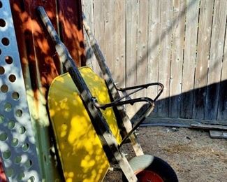 Yellow Wheel Barrow for using or planting