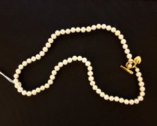 String of freshwater pearls with 14 carat gold clasp, 15 inches. Silent Auction.