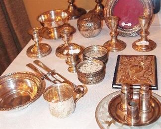 Sterling Frames, Candlesticks, bowls, trivets, notebooks, and coasters
