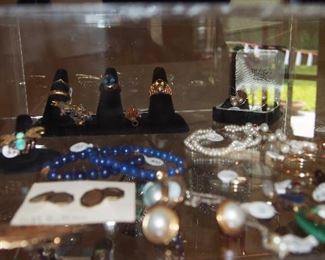 Lapis and gold bracelets, gold rings and pendants, pearls and more