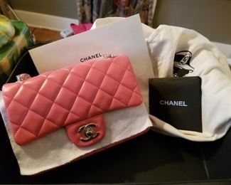 Chanel purse still in wrap with original box and cover