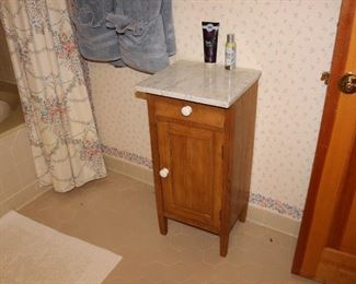marble top tiny cabinet