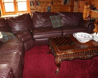 well worn leather sofa set