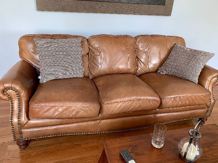 Leather couch w/matching love seat and side seat and ottoman