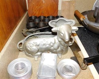 lots of kitchenware pots and pans