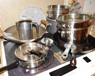 lots of kitchenware pots and pans