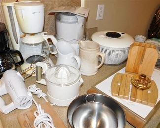 lots of kitchenware pots and pans
