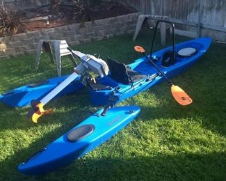 two freedom hawk stand up fishing  kayaks each with electric motor and fish finder