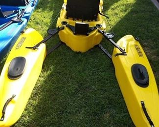 two freedom hawk stand up fishing  kayaks each with electric motor and fish finder