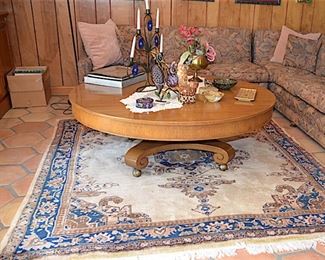 Rug with vintage/antique coffee table.